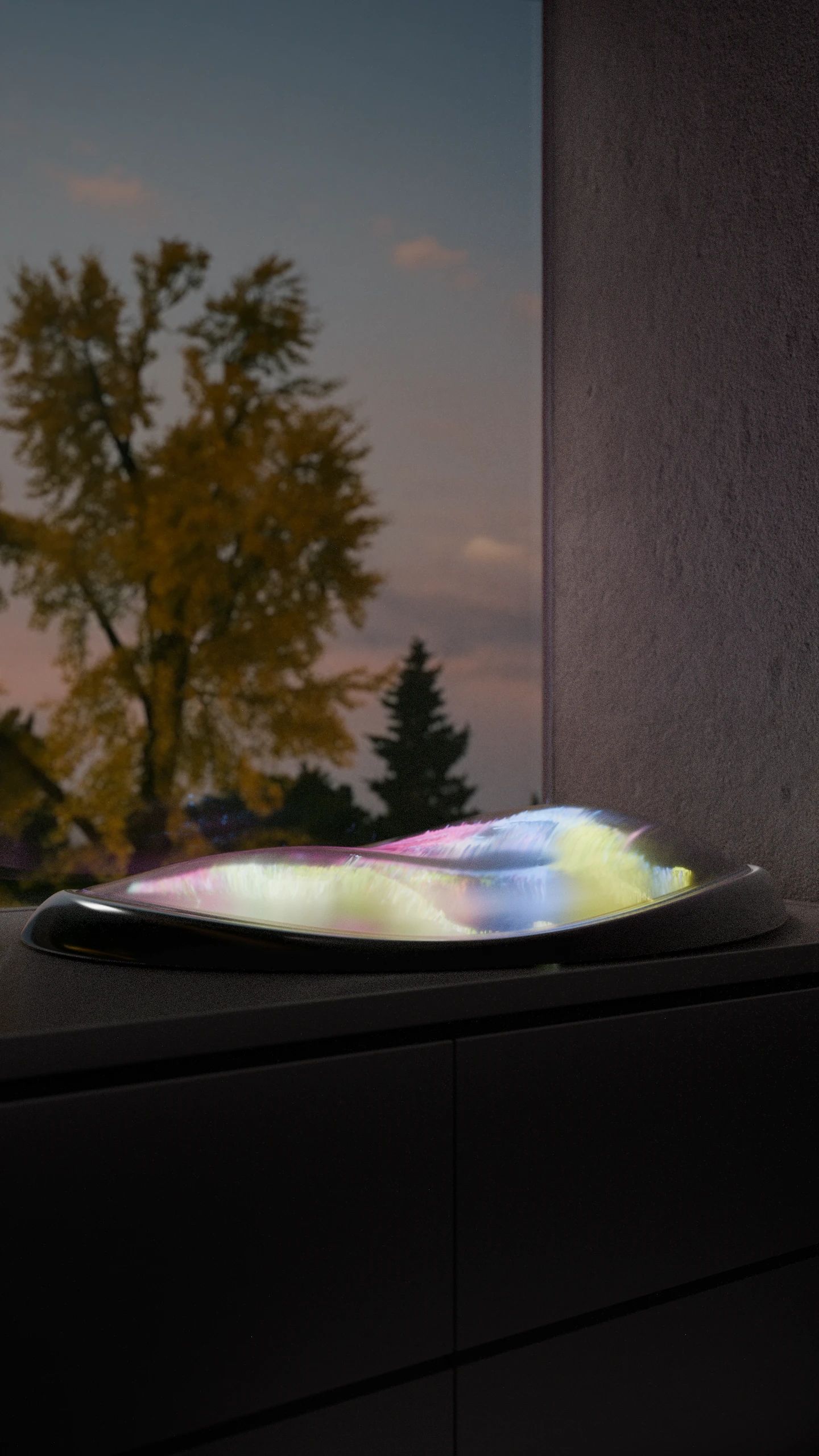 The Grief Pod glowing with soft colored visualizations on a sideboard at dusk