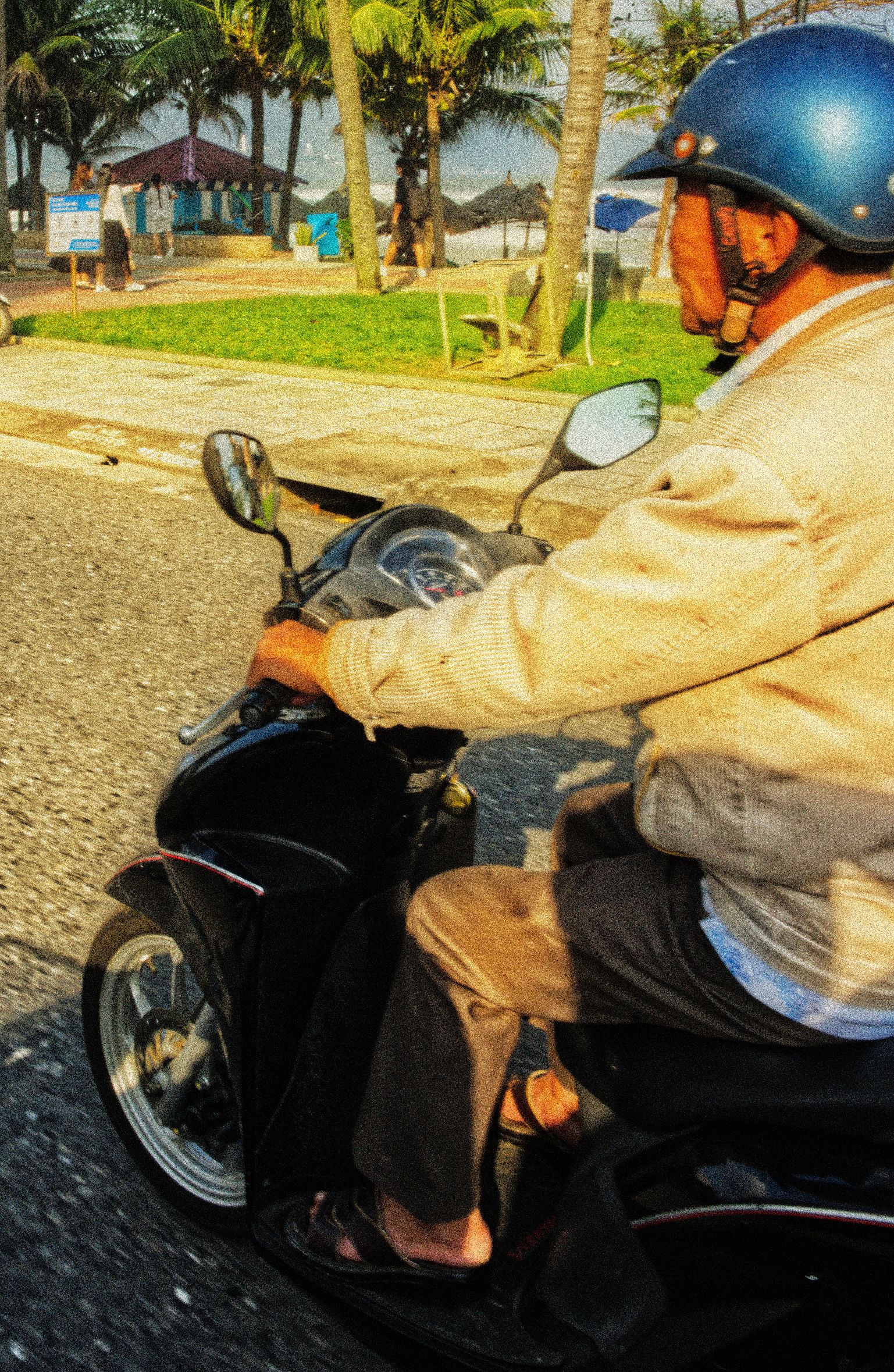Vietnam — rider by the beach promenade